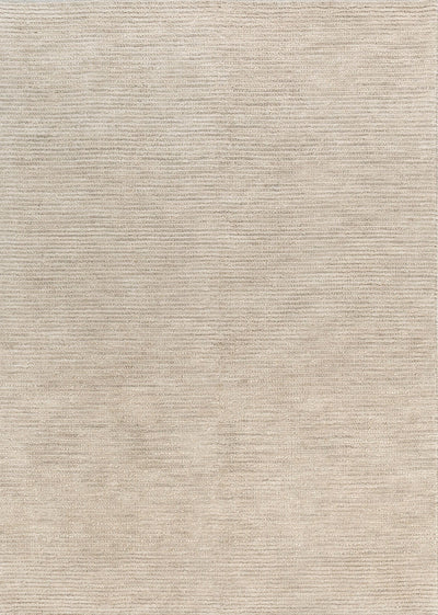 Tuscany Beige Wool Rug in a modern living room with timber and linen furniture