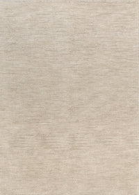 Tuscany Beige Wool Rug in a modern living room with timber and linen furniture