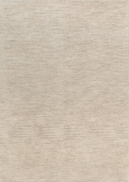 Tuscany Beige Wool Rug in a modern living room with timber and linen furniture