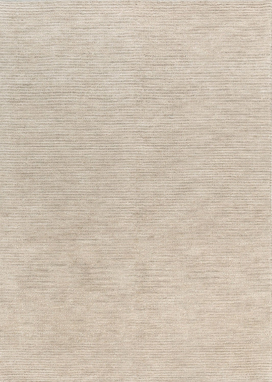 Tuscany Beige Wool Rug in a modern living room with timber and linen furniture